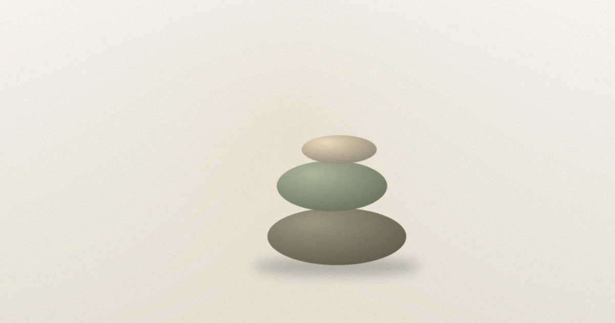 Three smooth stones balanced on top of each other.