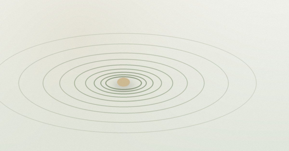 Ondas tranquilas que se abren en círculos desde un solo punto.