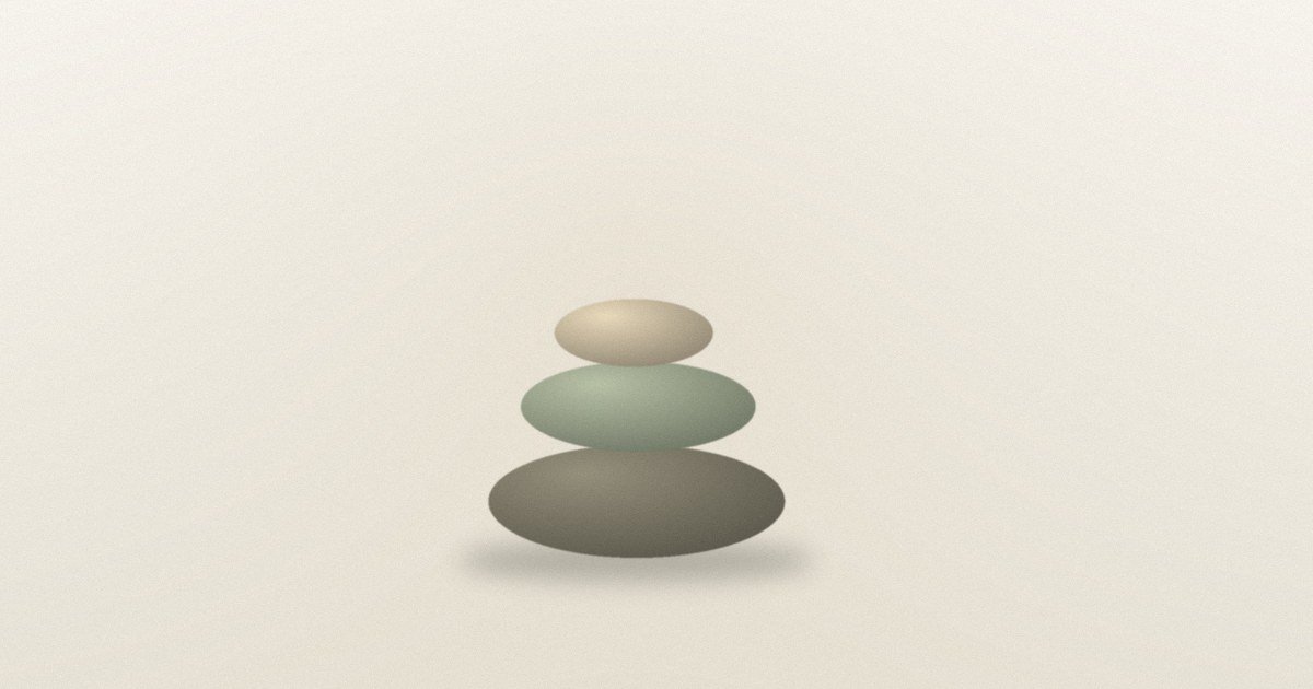 Tres piedras lisas en equilibrio, una sobre otra.