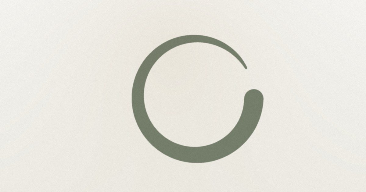 An open circle drawn in a single brushstroke.